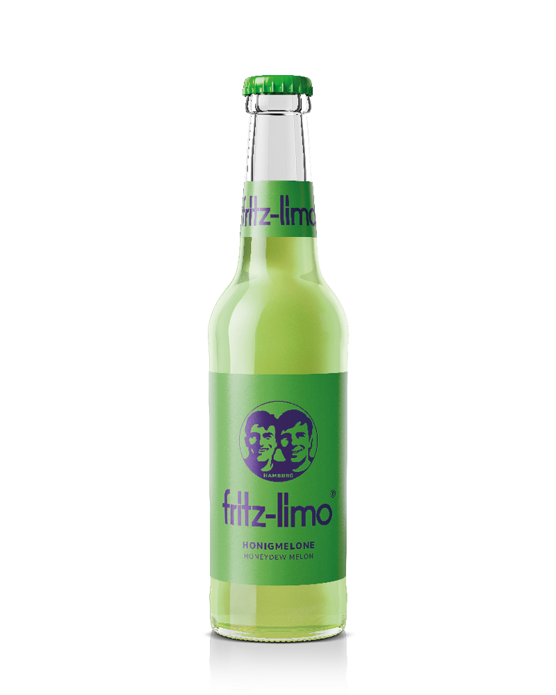 glasflasche fritz-limo honigmelone mit grünem etikett und kondenswasser und eis