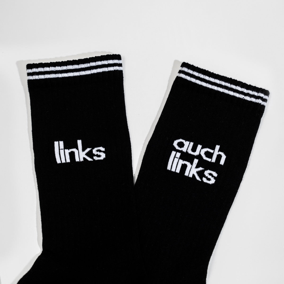 socken 'links' und 'auch links' - schwarz